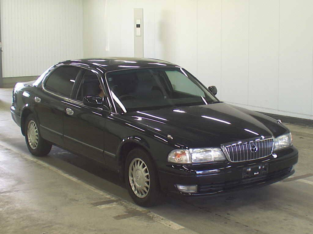 Mazda Sentia II (HE) Седан 1995—2000